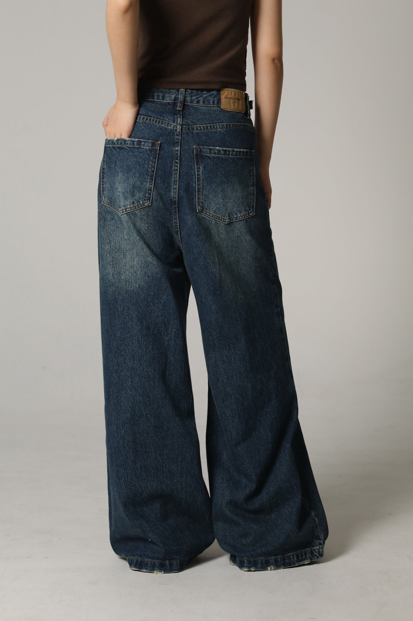 Side belt wide flare denim pants NZK6069