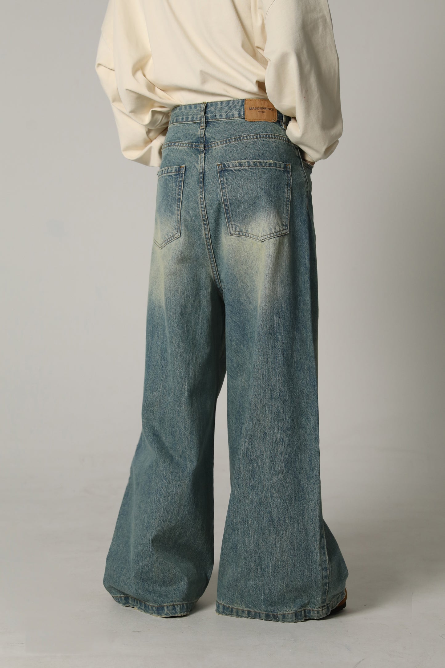 Side belt wide flare denim pants NZK6069